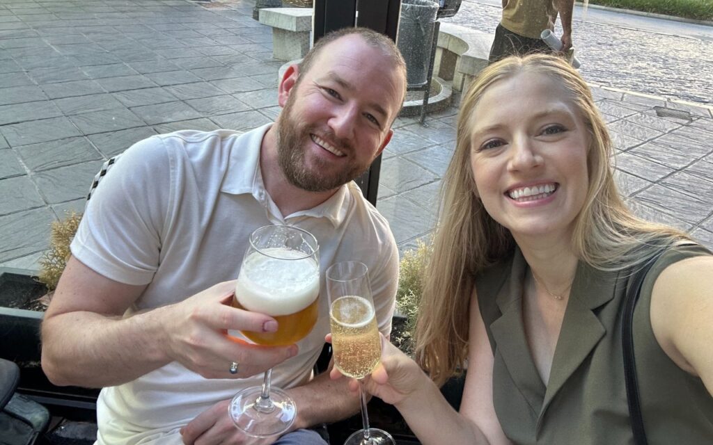 Carl and I enjoying a beer and champagne after dropping the girls off at school! 