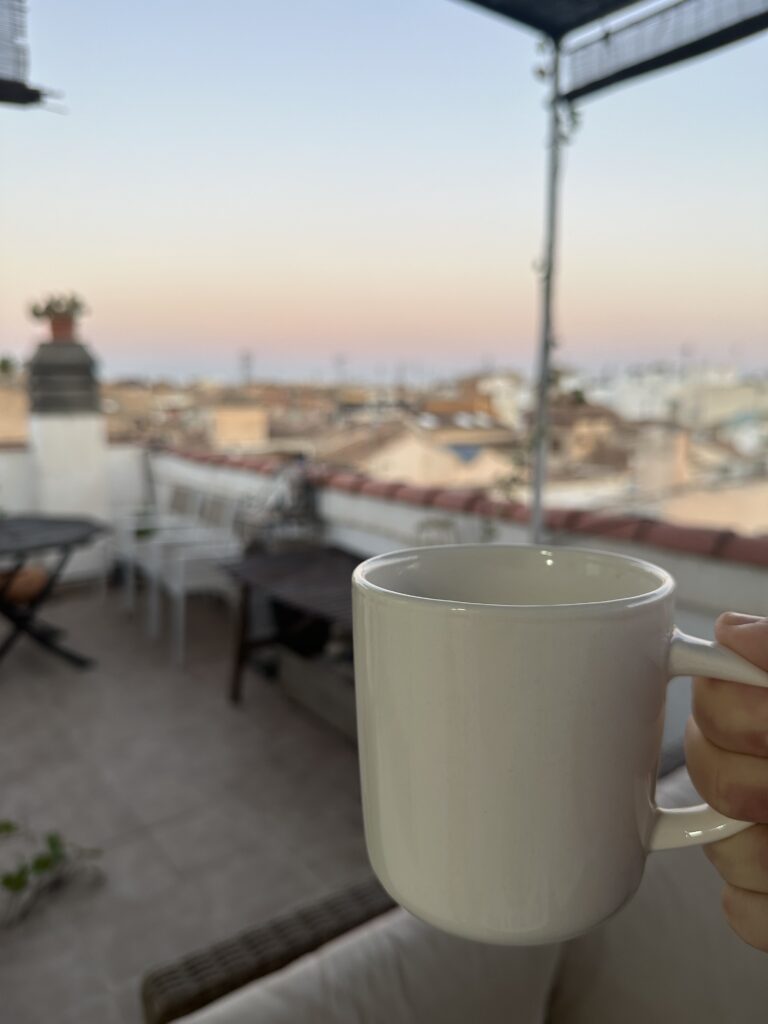 Enjoying a coffee on a rooftop in Spain